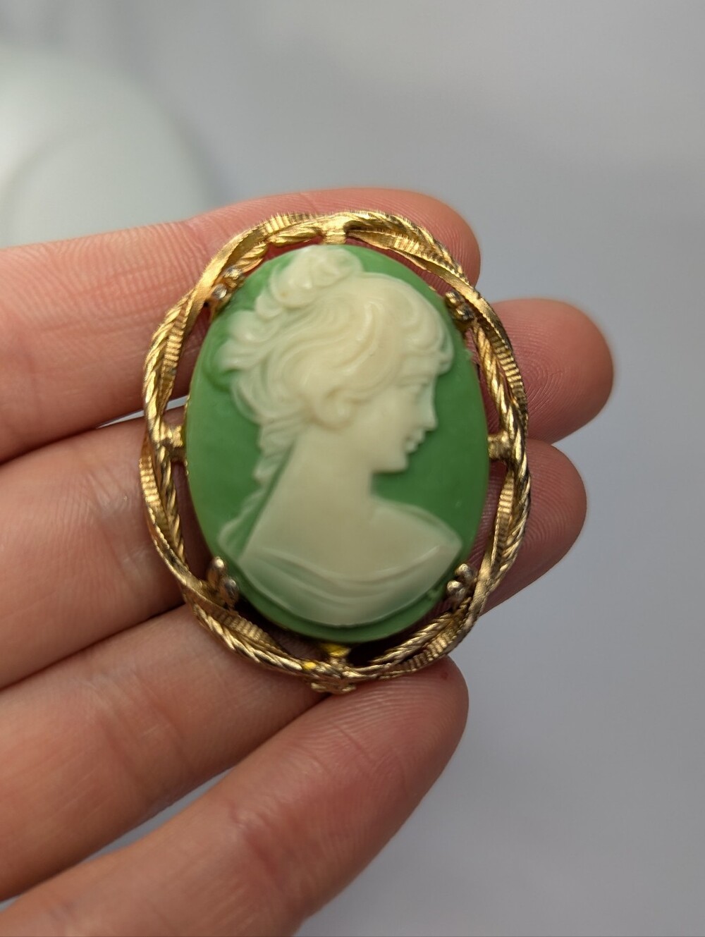 Vintage-Inspired Green Cameo Brooch with Gold Frame